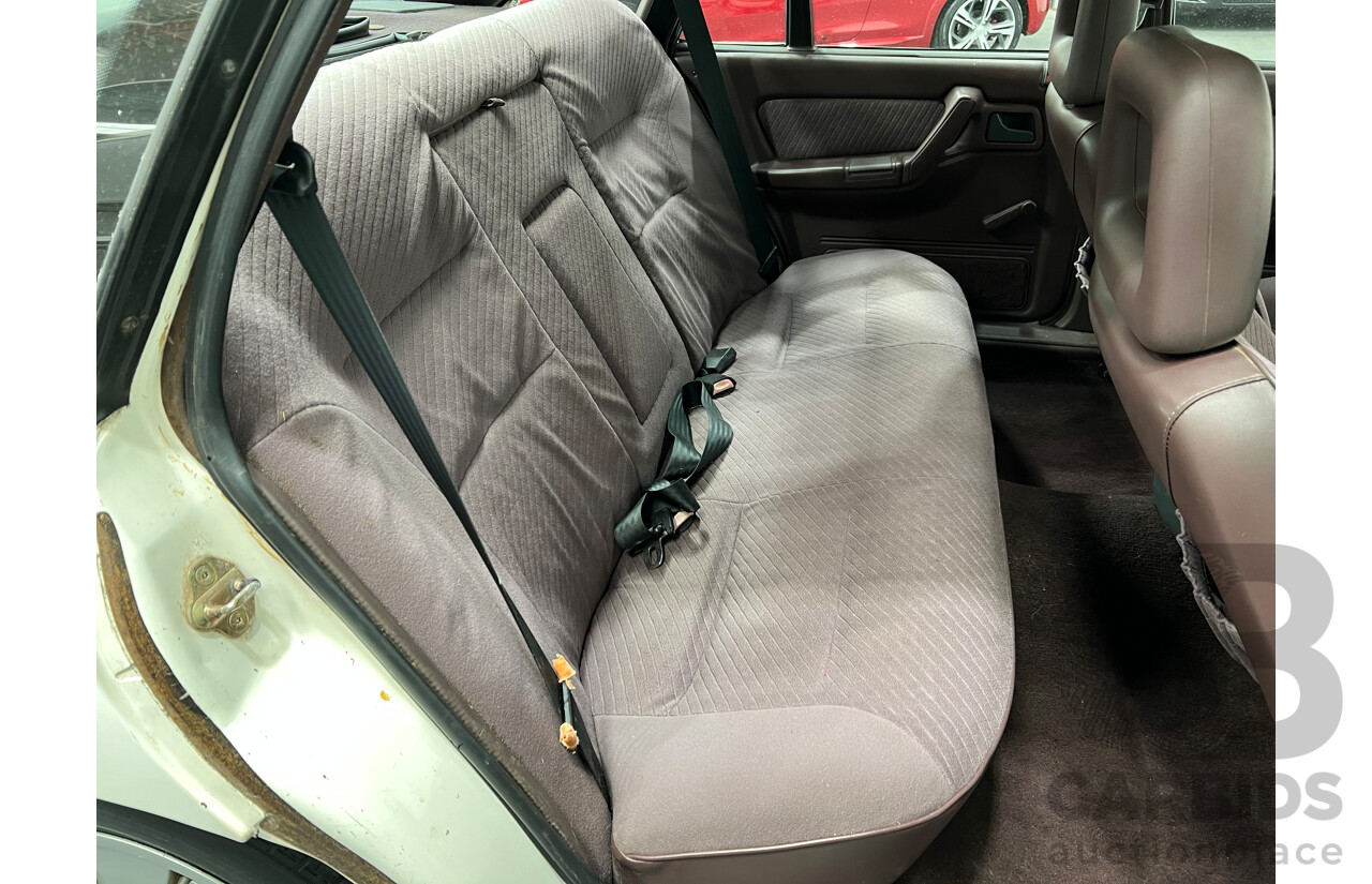 8/1990 Holden Berlina  VN 4d Sedan White 3.8L V6