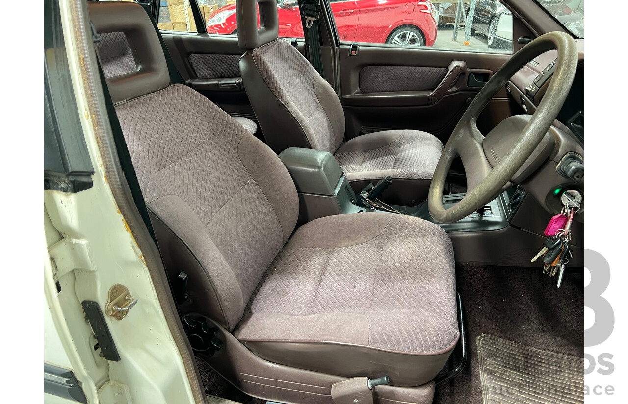 8/1990 Holden Berlina  VN 4d Sedan White 3.8L V6