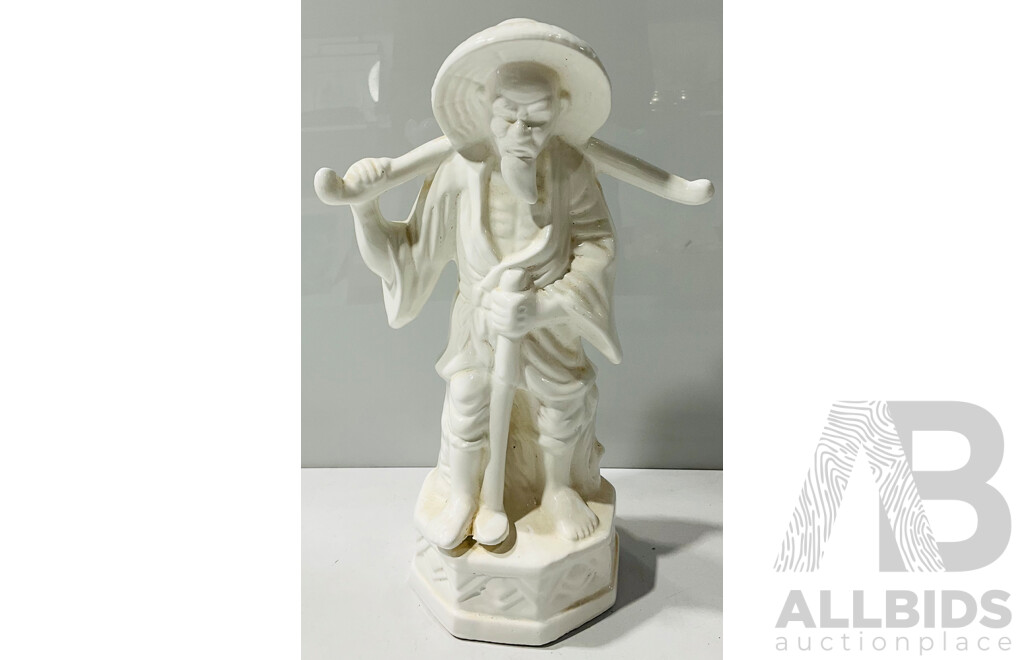 White Ceramic Man Figure