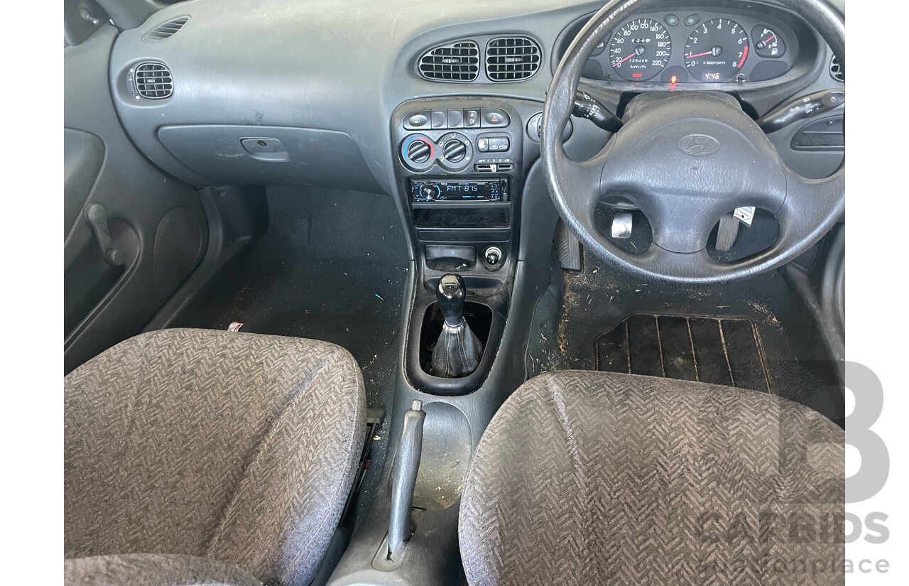 2/1996 Hyundai Lantra GL J2 4d Sedan White 1.8L