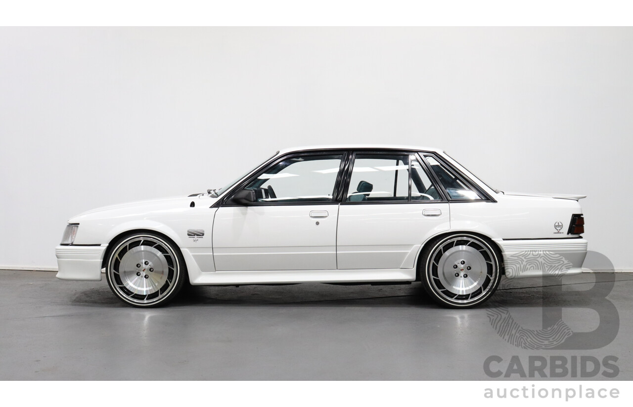 12/1984 Holden Commodore VK Group 3 Replica 4d Sedan White 6.0L V8