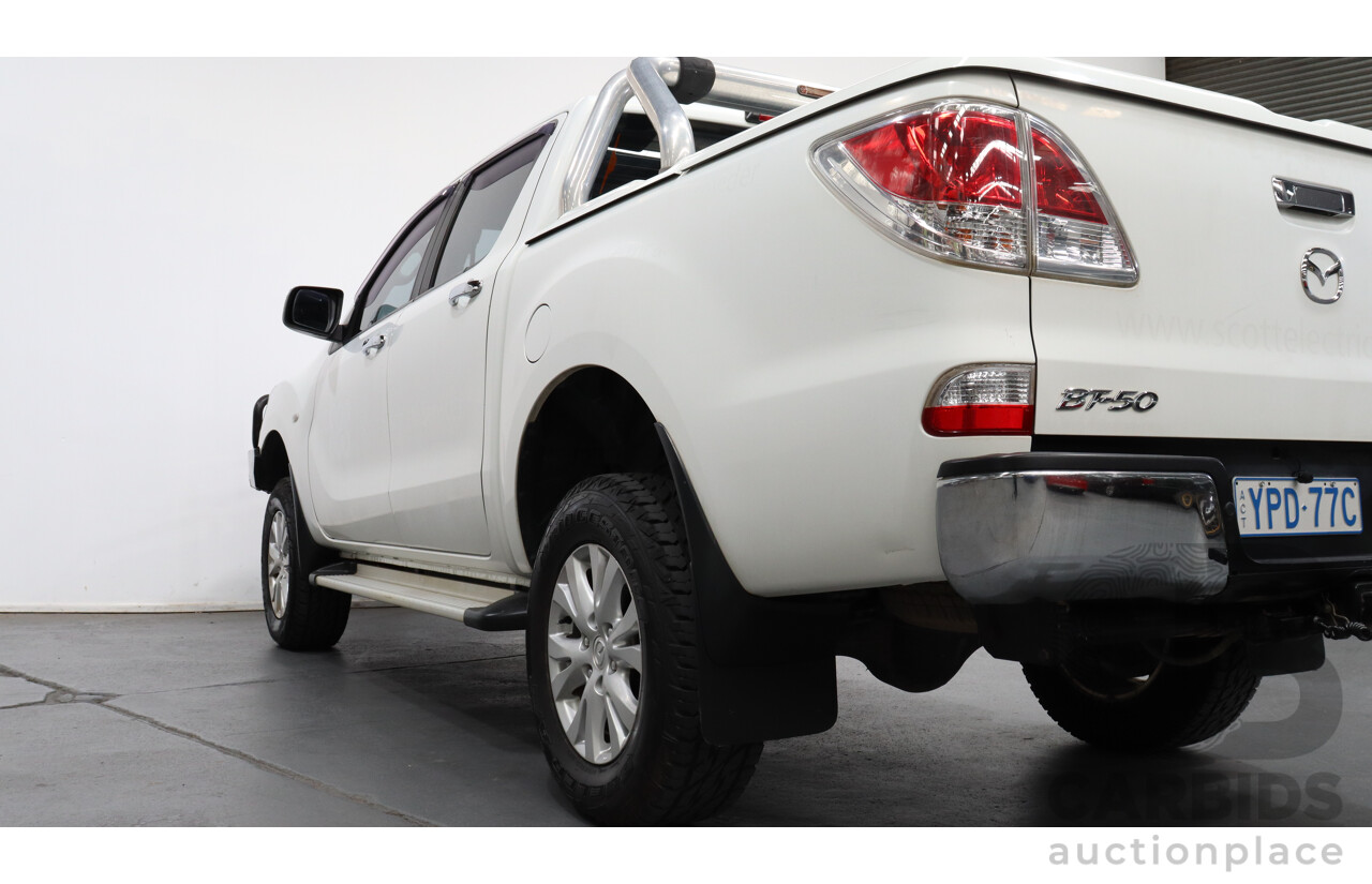 10/2013 Mazda Bt50 GT (4x4)  Dual Cab Utility White 3.2L Turbo Diesel