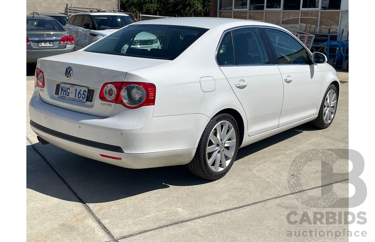 6/2010 Volkswagen Jetta 103 TDI 1KM MY10 4d Sedan White 2.0L