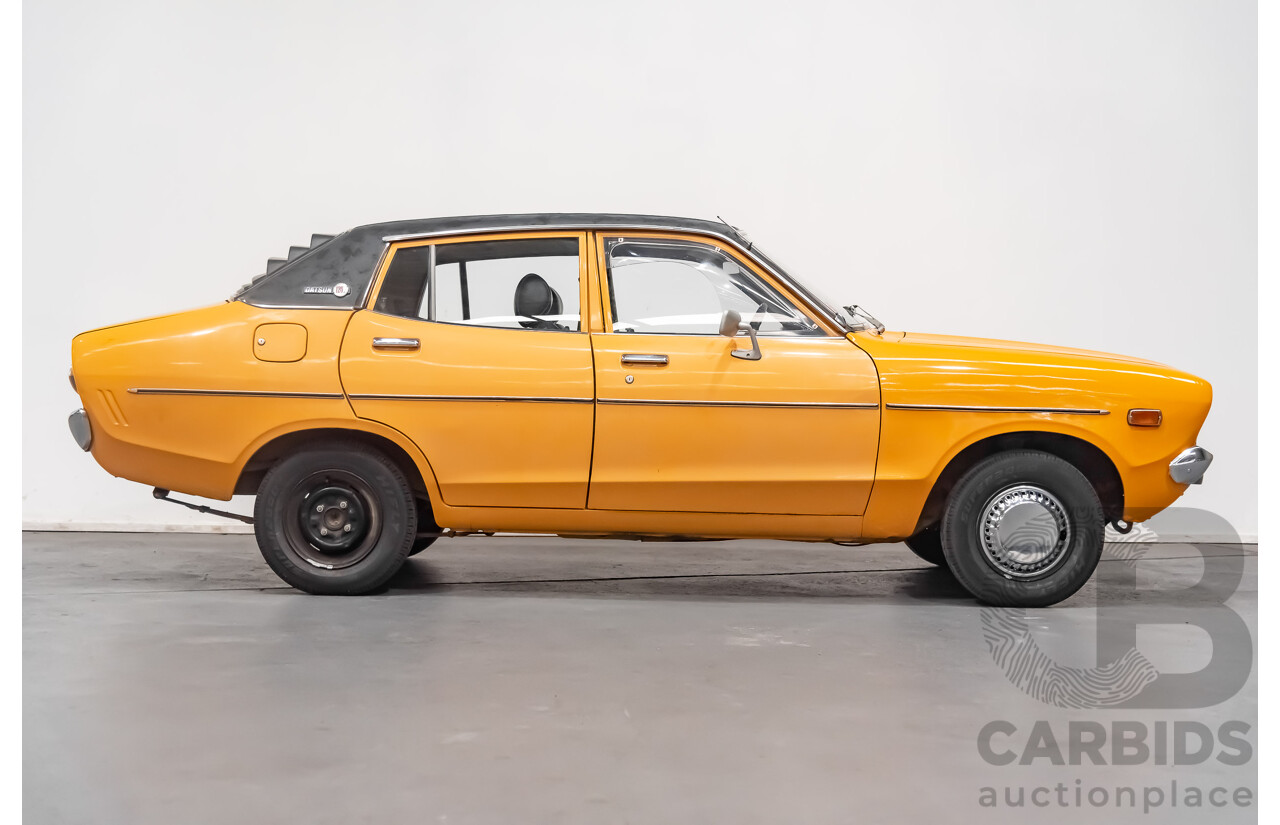 12/1976 Datsun 120y GL 4d Sedan Orange 1.2L