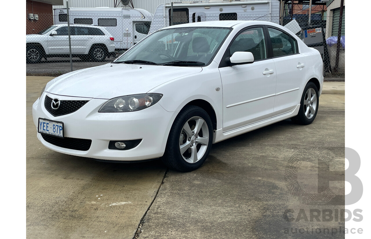 12/2005 Mazda Mazda3 MAXX Sport BK 5d Hatchback White 2.0L