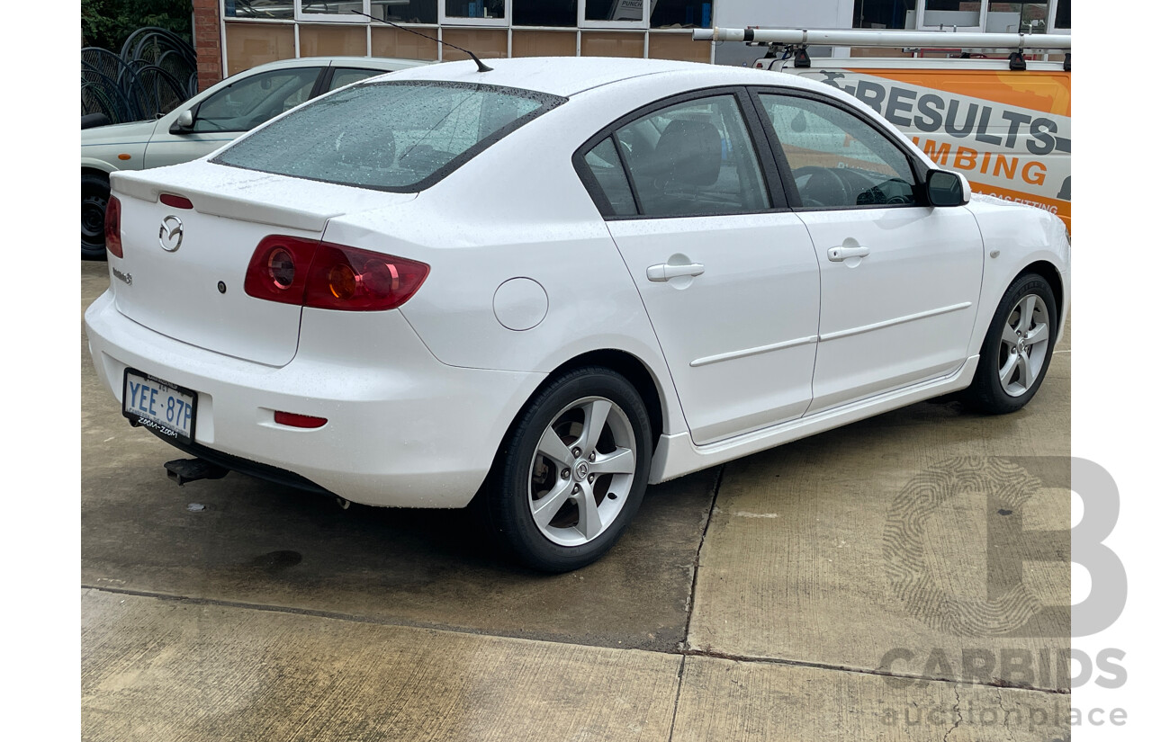 12/2005 Mazda Mazda3 MAXX Sport BK 5d Hatchback White 2.0L