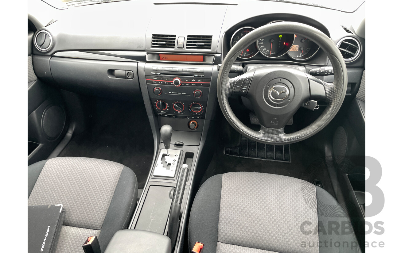 12/2005 Mazda Mazda3 MAXX Sport BK 5d Hatchback White 2.0L