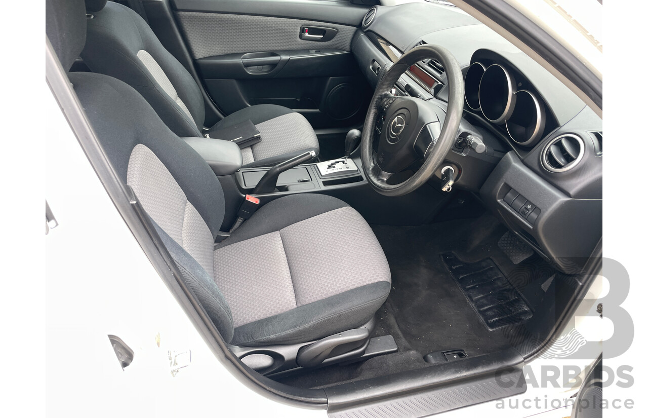 12/2005 Mazda Mazda3 MAXX Sport BK 5d Hatchback White 2.0L