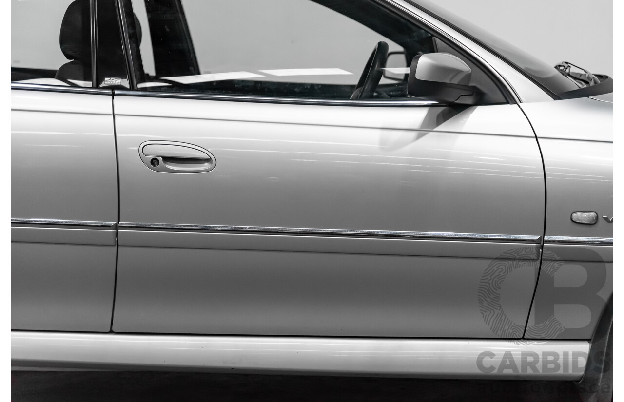 4/2004 Holden Calais VYII 4d Sedan Silver 5.7L V8