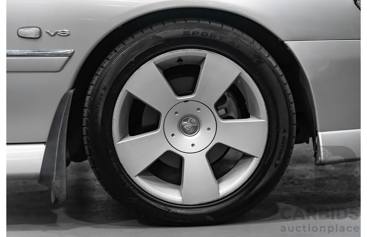 4/2004 Holden Calais VYII 4d Sedan Silver 5.7L V8