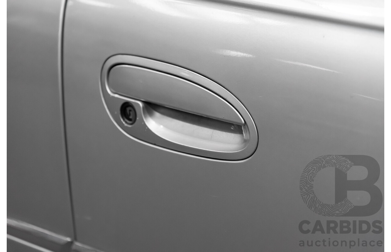 4/2004 Holden Calais VYII 4d Sedan Silver 5.7L V8