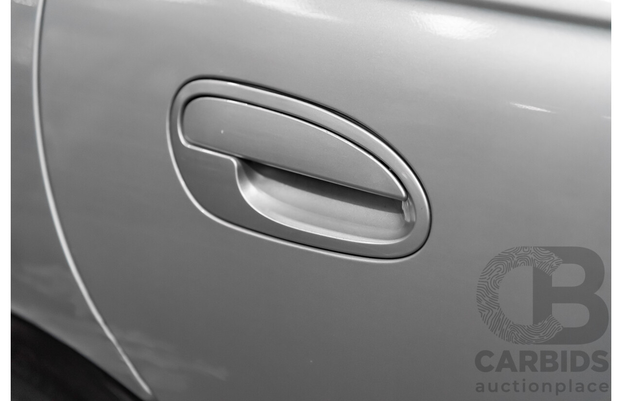 4/2004 Holden Calais VYII 4d Sedan Silver 5.7L V8