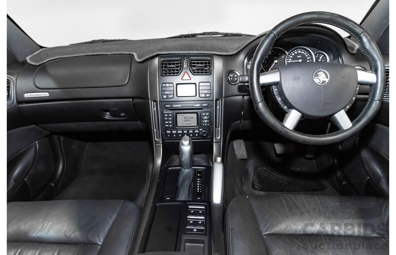 4/2004 Holden Calais VYII 4d Sedan Silver 5.7L V8