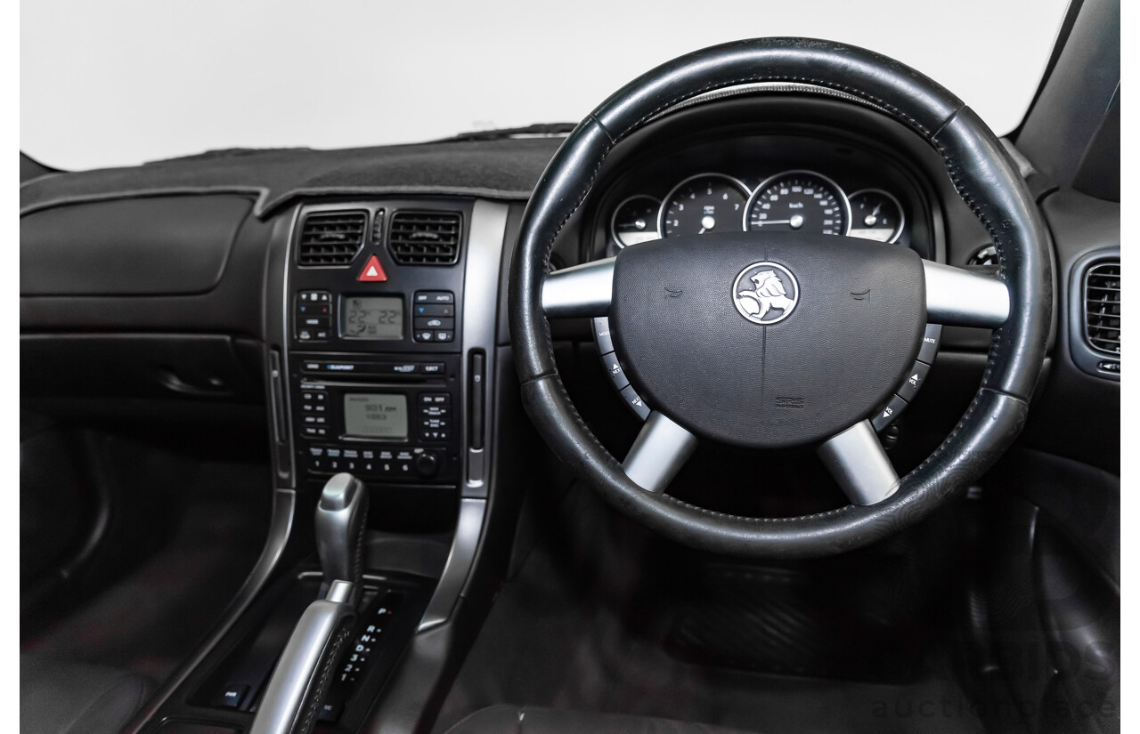 4/2004 Holden Calais VYII 4d Sedan Silver 5.7L V8