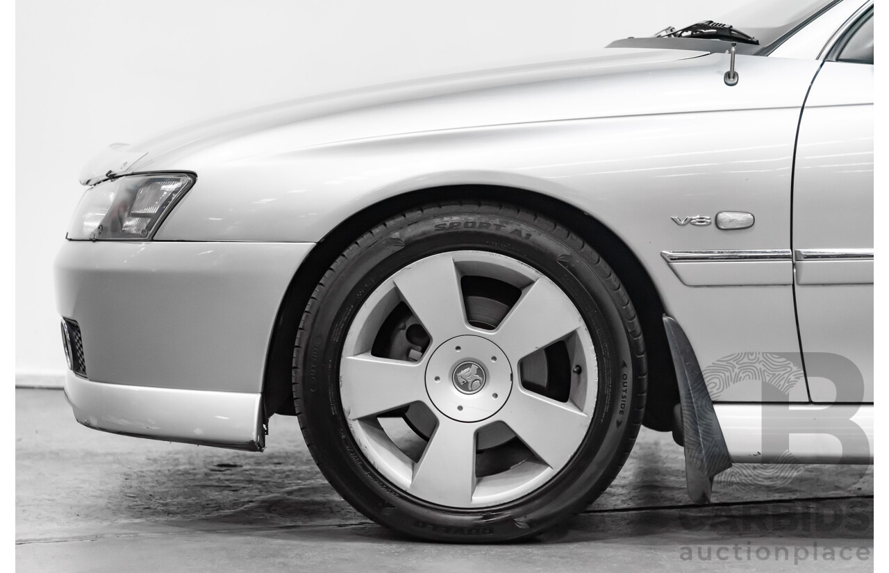4/2004 Holden Calais VYII 4d Sedan Silver 5.7L V8