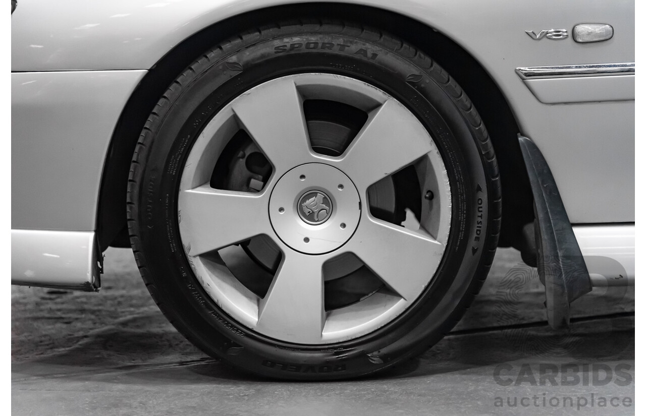 4/2004 Holden Calais VYII 4d Sedan Silver 5.7L V8