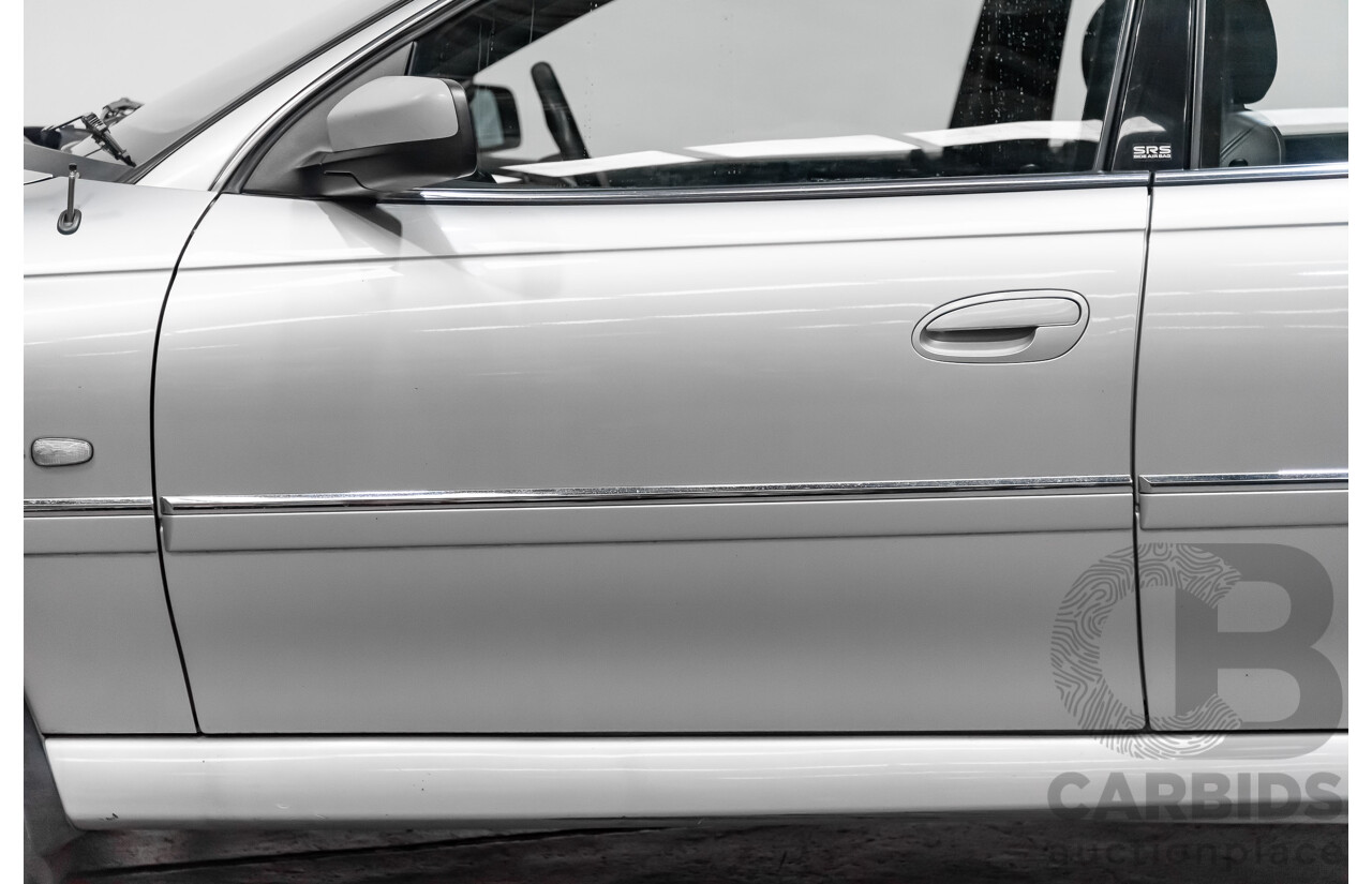 4/2004 Holden Calais VYII 4d Sedan Silver 5.7L V8