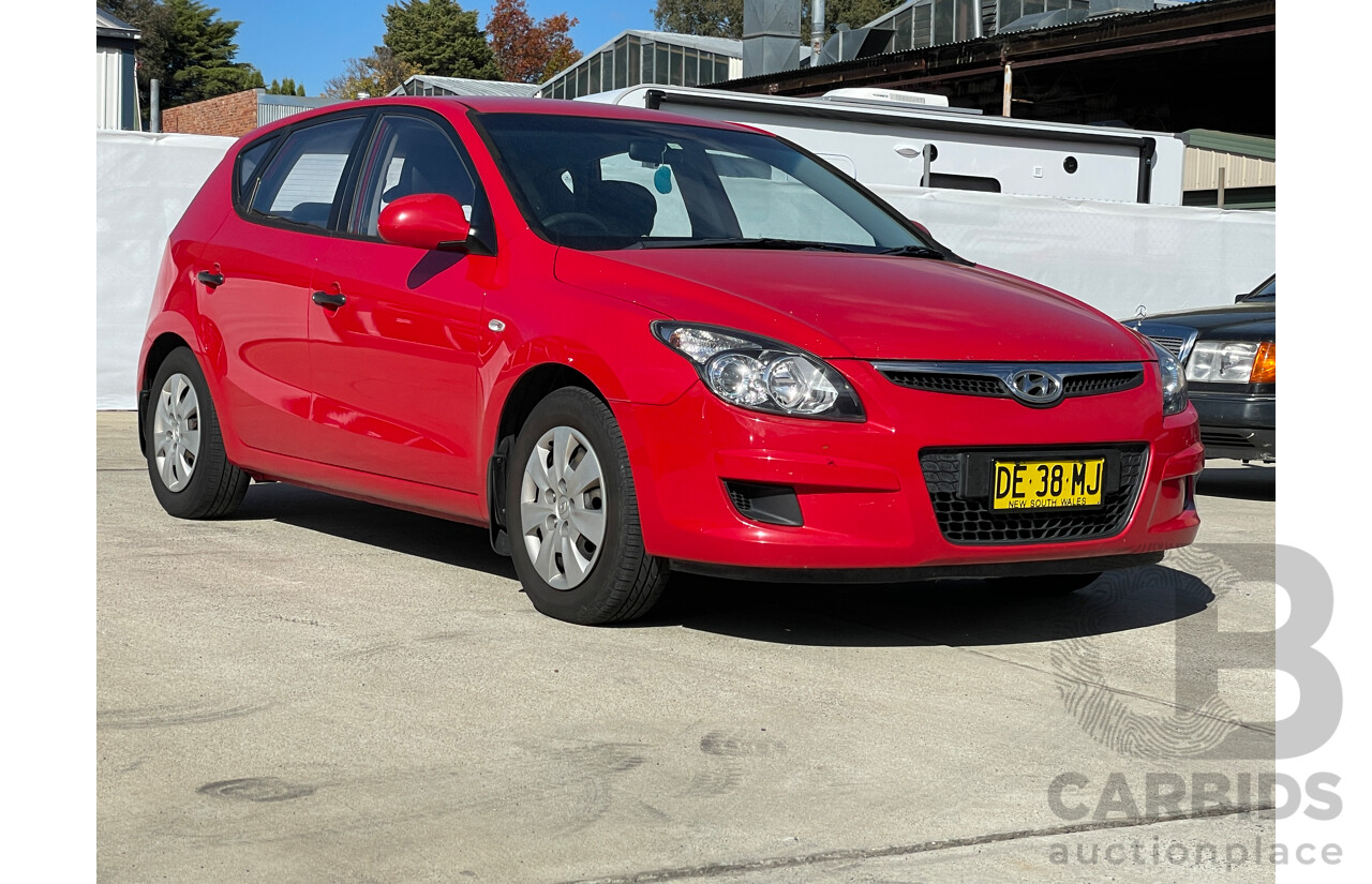 7/2010 Hyundai i30 SX FD MY10 5d Hatchback Red 1.6L