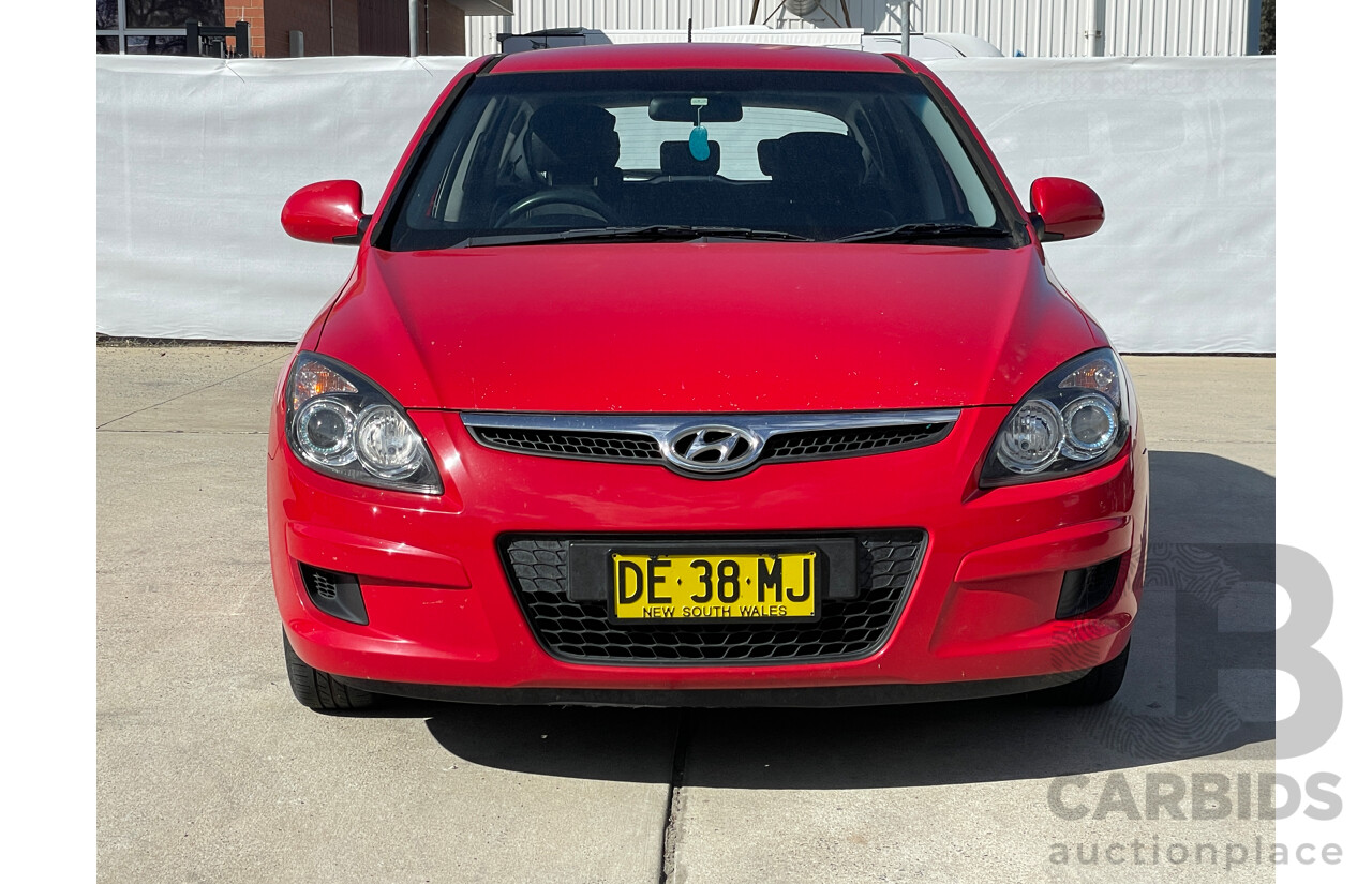 7/2010 Hyundai i30 SX FD MY10 5d Hatchback Red 1.6L