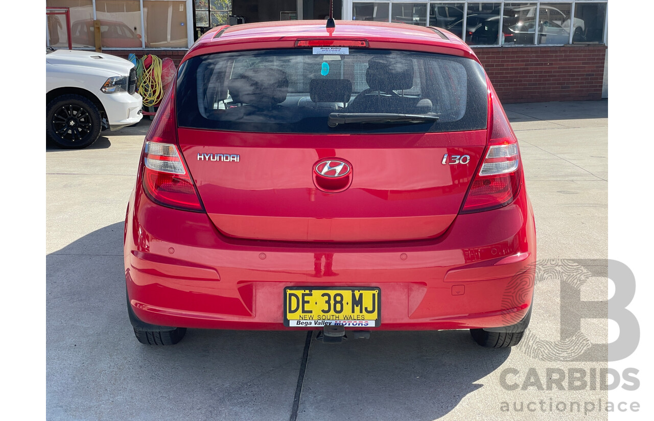 7/2010 Hyundai i30 SX FD MY10 5d Hatchback Red 1.6L
