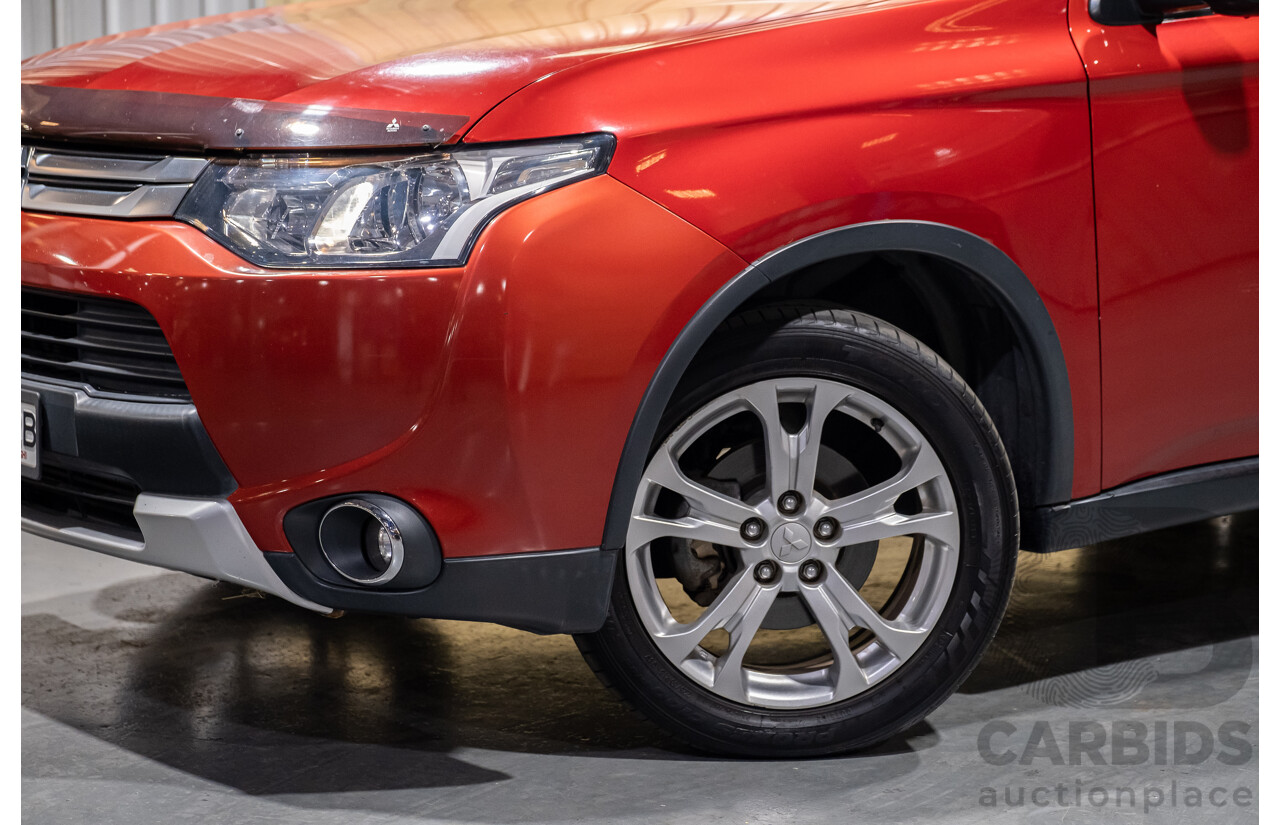 5/2014 Mitsubishi Outlander LS (4x4) ZJ MY14 4d Wagon Red Turbo Diesel 2.3L - 7 Seater