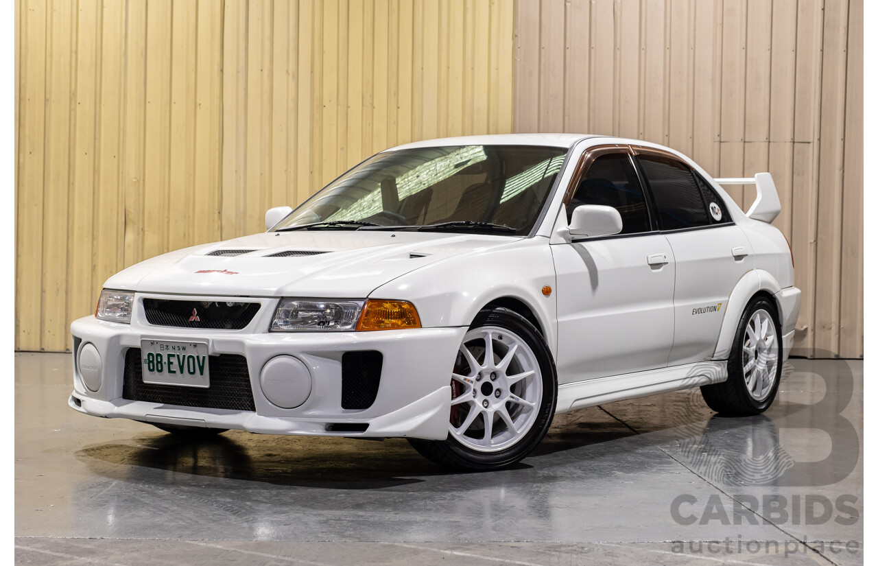 02/1998 Mitsubishi Lancer Evolution V AWD (Evo 5) 4d Sedan White Turbocharged 2.0L - Import