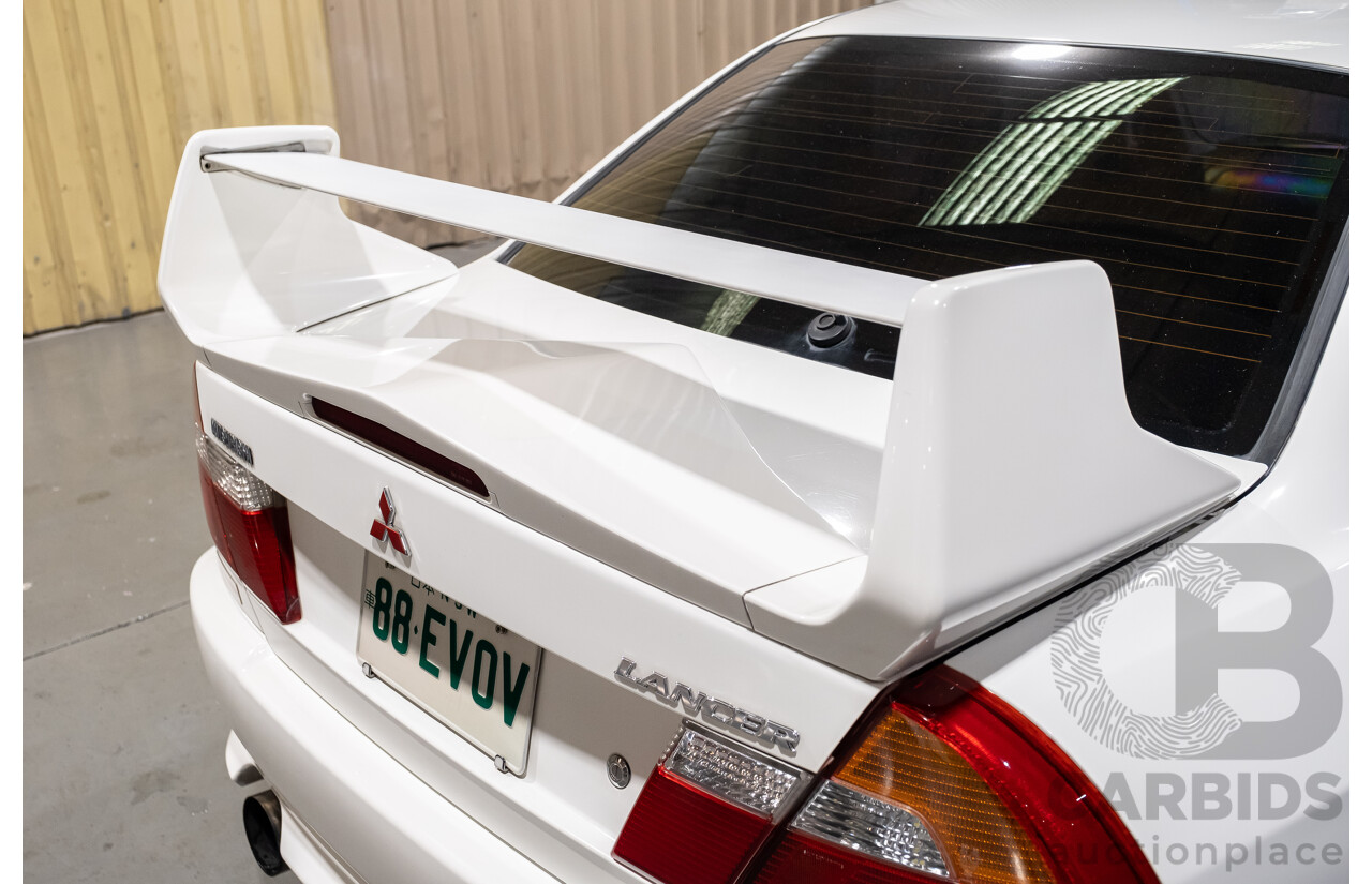 02/1998 Mitsubishi Lancer Evolution V AWD (Evo 5) 4d Sedan White Turbocharged 2.0L - Import