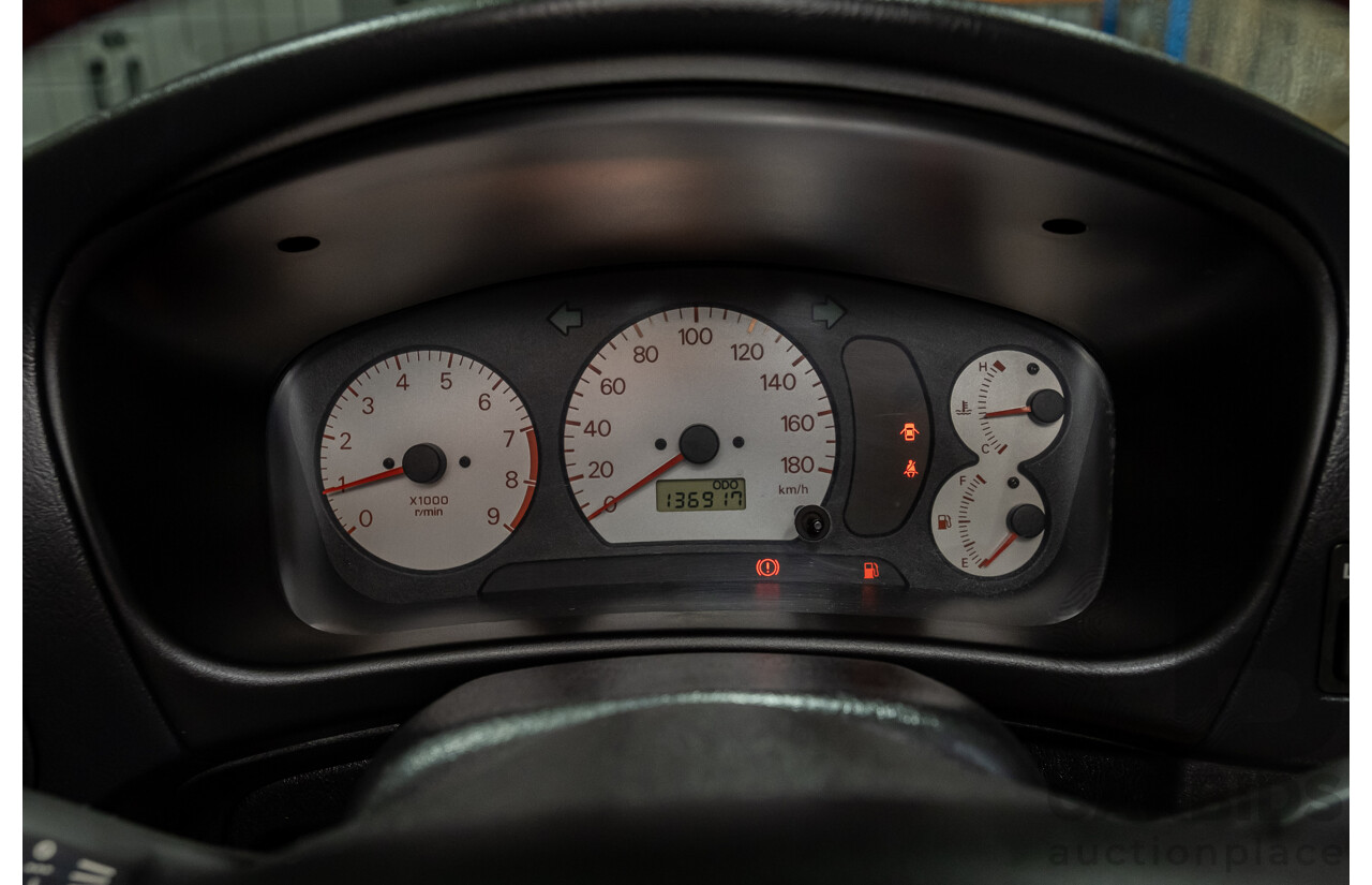 02/1998 Mitsubishi Lancer Evolution V AWD (Evo 5) 4d Sedan White Turbocharged 2.0L - Import