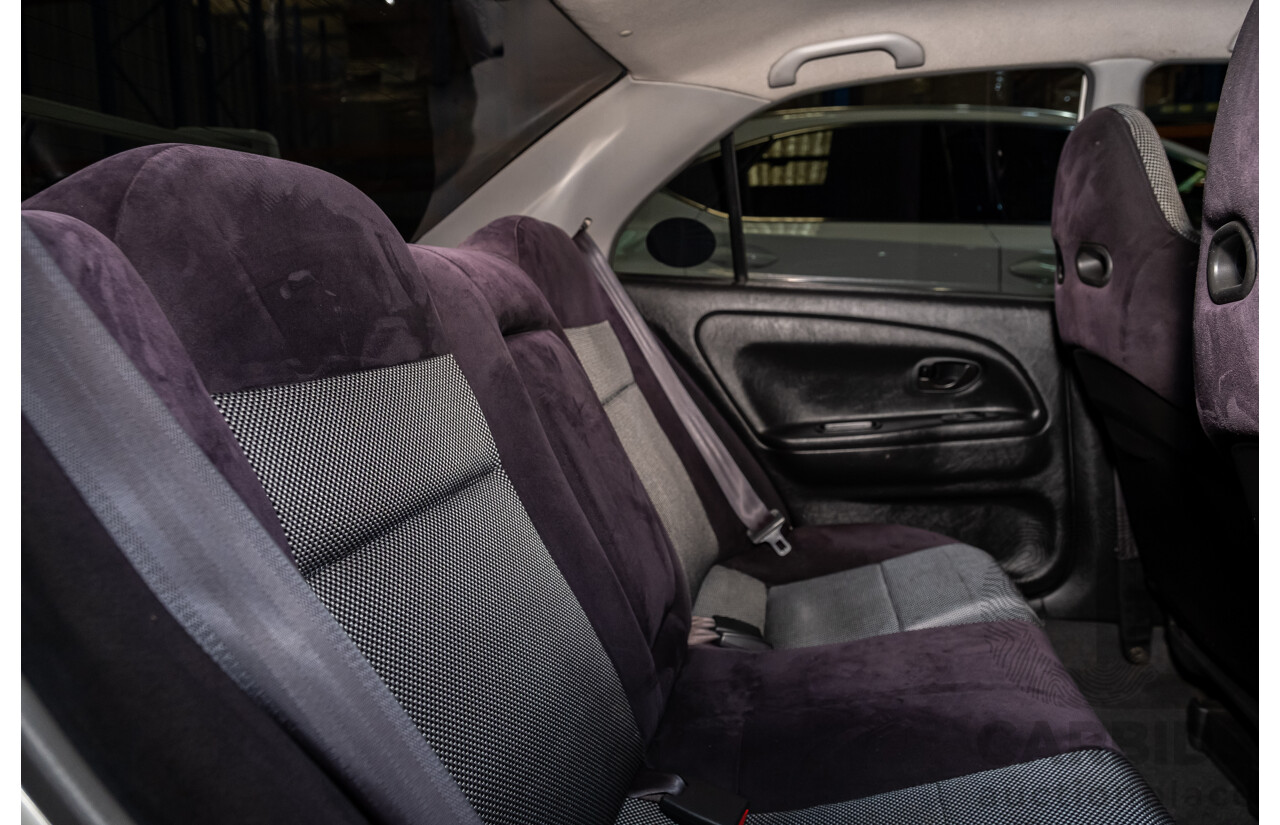 02/1998 Mitsubishi Lancer Evolution V AWD (Evo 5) 4d Sedan White Turbocharged 2.0L - Import