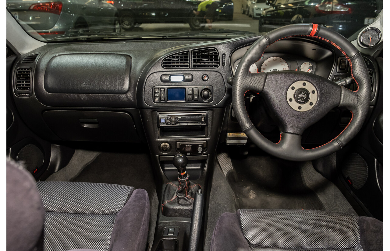 02/1998 Mitsubishi Lancer Evolution V AWD (Evo 5) 4d Sedan White Turbocharged 2.0L - Import