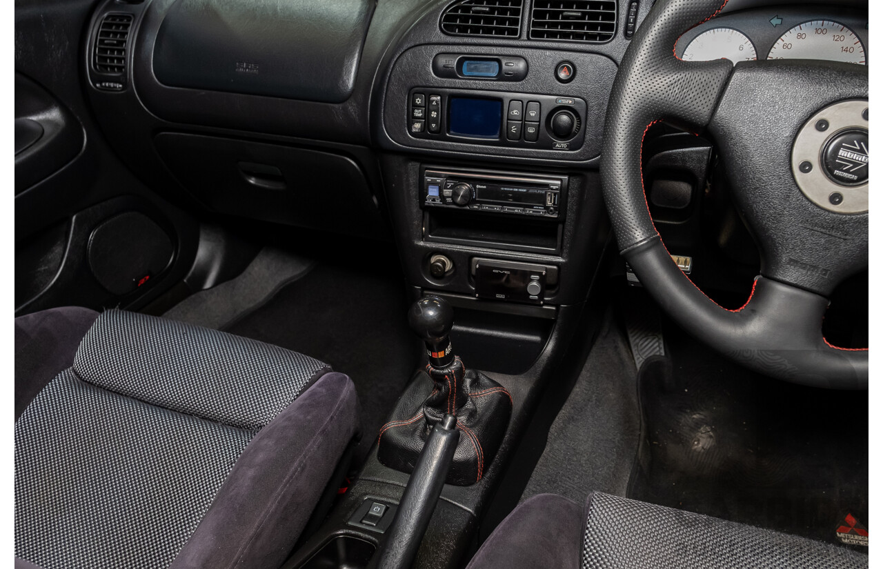 02/1998 Mitsubishi Lancer Evolution V AWD (Evo 5) 4d Sedan White Turbocharged 2.0L - Import