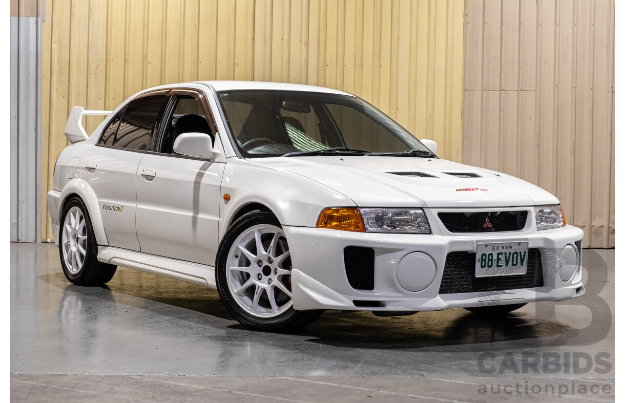 02/1998 Mitsubishi Lancer Evolution V AWD (Evo 5) 4d Sedan White Turbocharged 2.0L - Import