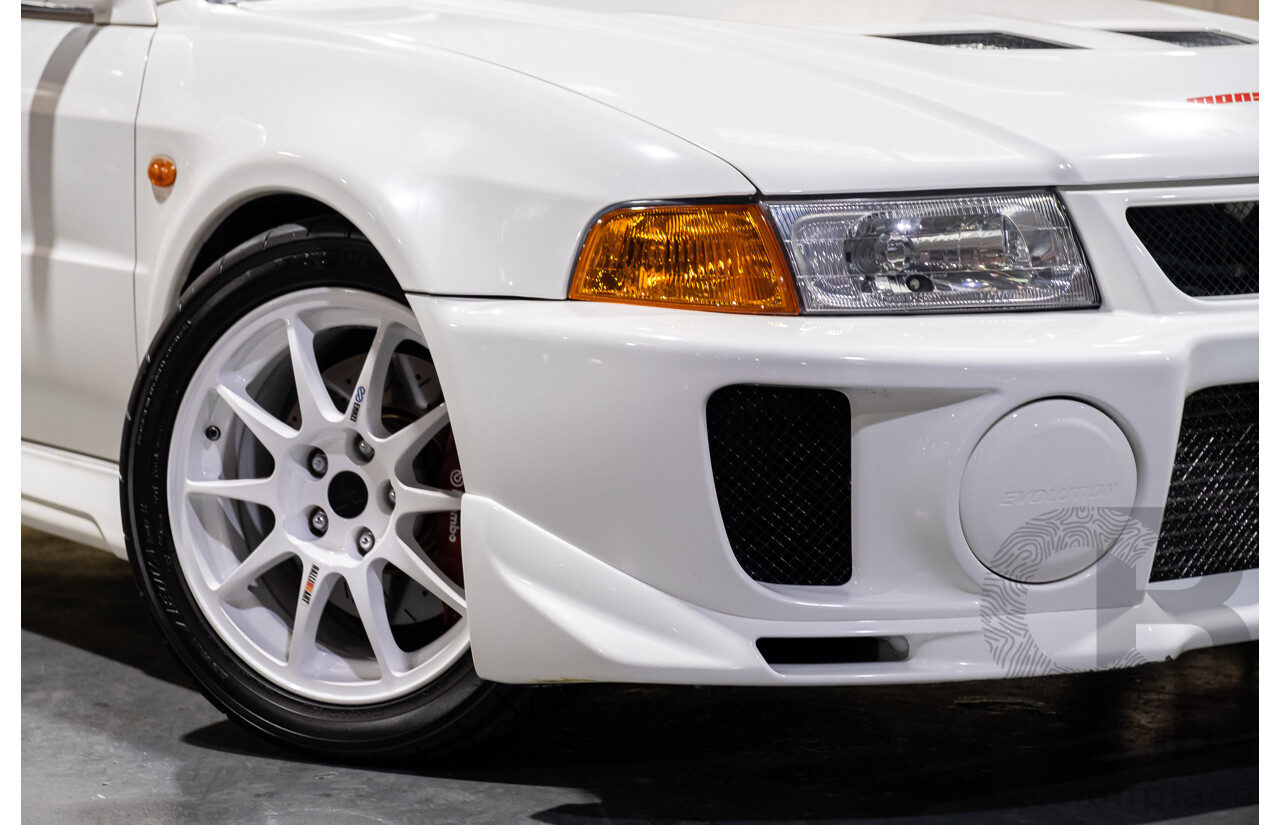 02/1998 Mitsubishi Lancer Evolution V AWD (Evo 5) 4d Sedan White Turbocharged 2.0L - Import