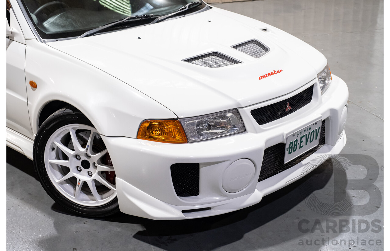 02/1998 Mitsubishi Lancer Evolution V AWD (Evo 5) 4d Sedan White Turbocharged 2.0L - Import