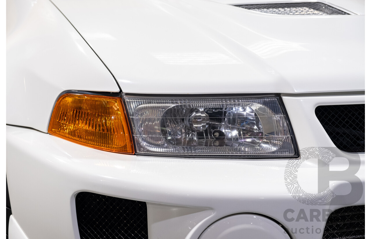 02/1998 Mitsubishi Lancer Evolution V AWD (Evo 5) 4d Sedan White Turbocharged 2.0L - Import