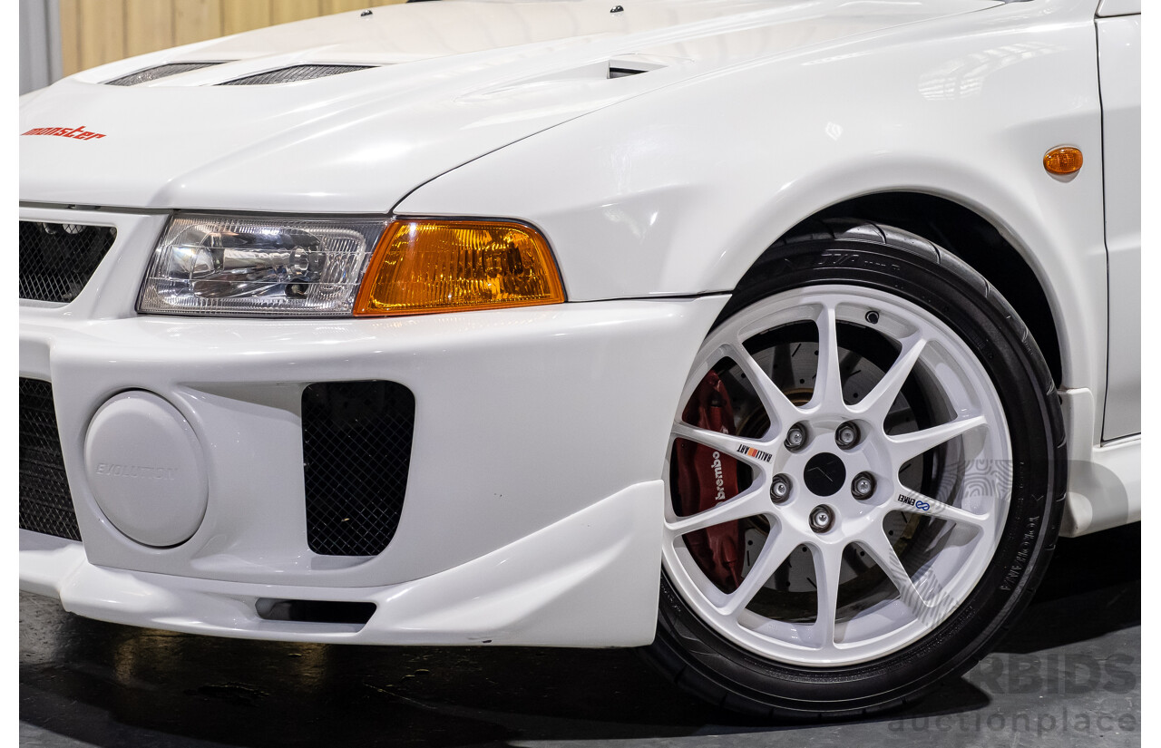 02/1998 Mitsubishi Lancer Evolution V AWD (Evo 5) 4d Sedan White Turbocharged 2.0L - Import
