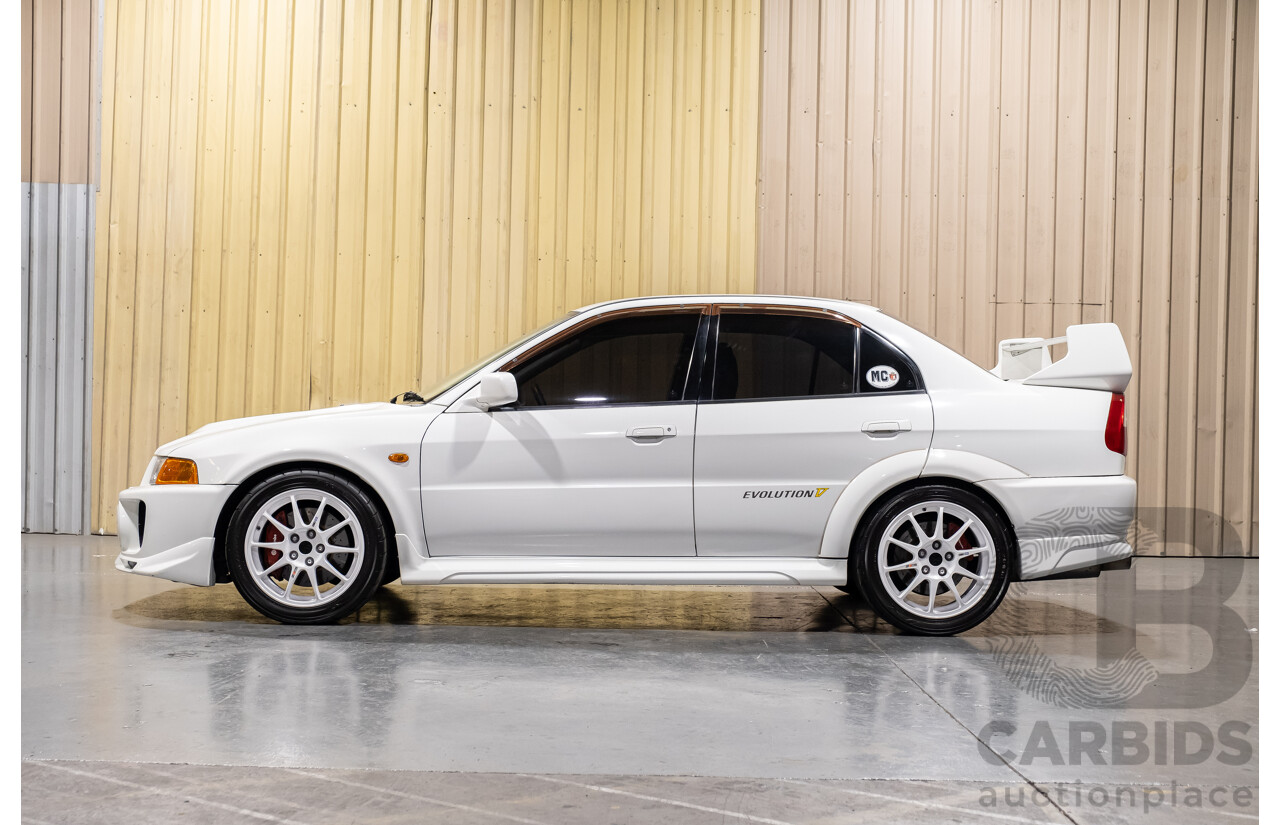 02/1998 Mitsubishi Lancer Evolution V AWD (Evo 5) 4d Sedan White Turbocharged 2.0L - Import