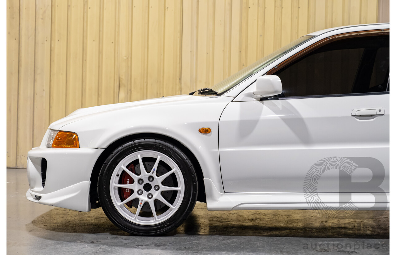 02/1998 Mitsubishi Lancer Evolution V AWD (Evo 5) 4d Sedan White Turbocharged 2.0L - Import