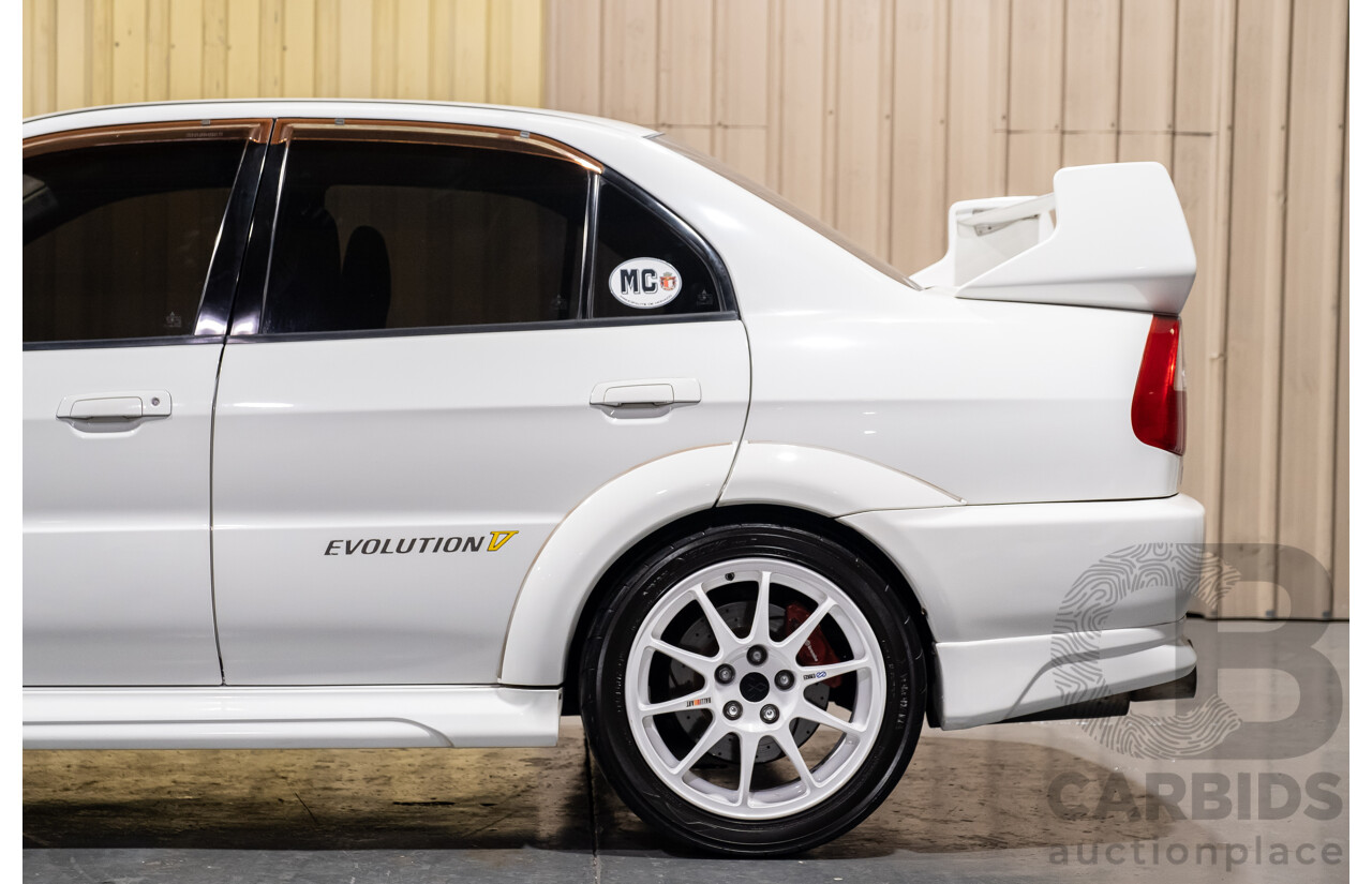 02/1998 Mitsubishi Lancer Evolution V AWD (Evo 5) 4d Sedan White Turbocharged 2.0L - Import