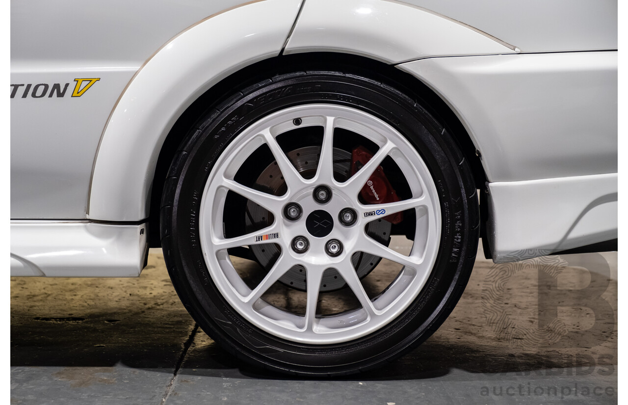 02/1998 Mitsubishi Lancer Evolution V AWD (Evo 5) 4d Sedan White Turbocharged 2.0L - Import