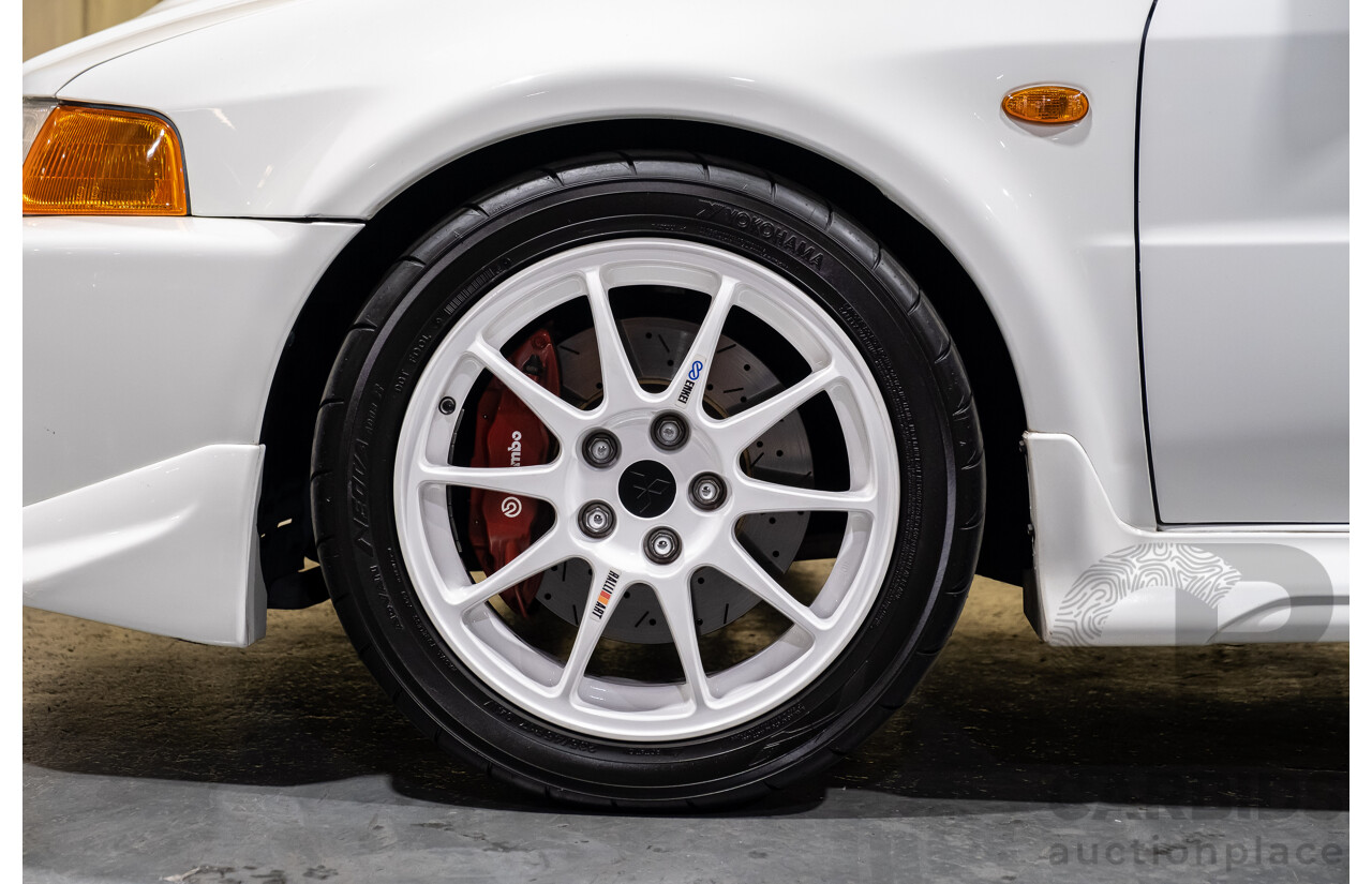 02/1998 Mitsubishi Lancer Evolution V AWD (Evo 5) 4d Sedan White Turbocharged 2.0L - Import