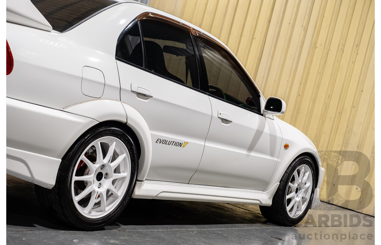 02/1998 Mitsubishi Lancer Evolution V AWD (Evo 5) 4d Sedan White Turbocharged 2.0L - Import
