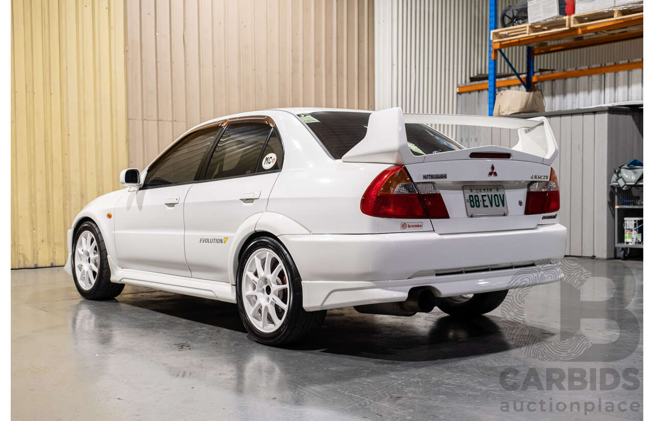 02/1998 Mitsubishi Lancer Evolution V AWD (Evo 5) 4d Sedan White Turbocharged 2.0L - Import