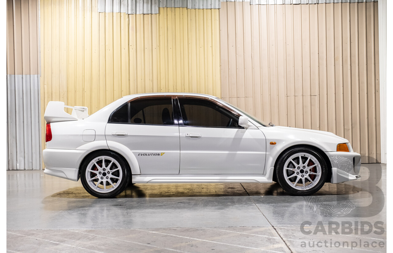 02/1998 Mitsubishi Lancer Evolution V AWD (Evo 5) 4d Sedan White Turbocharged 2.0L - Import