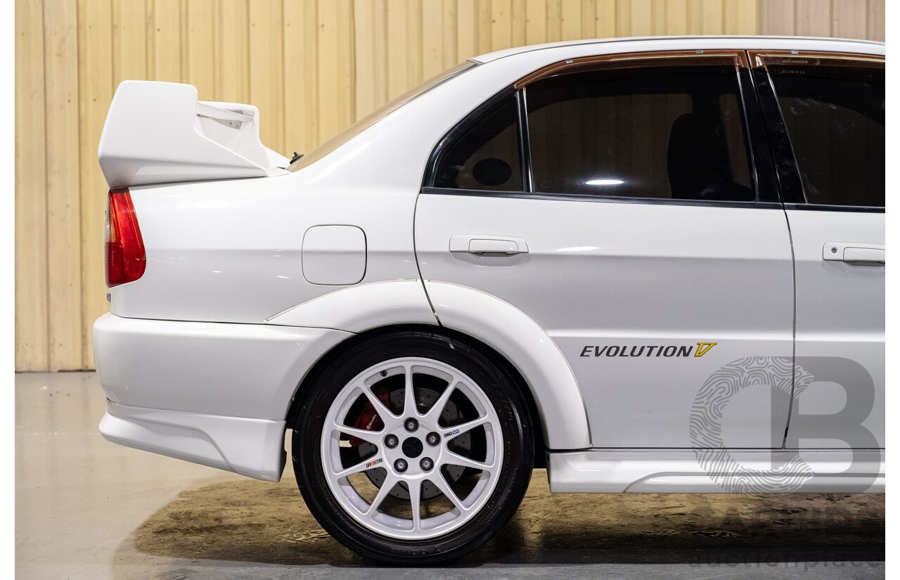 02/1998 Mitsubishi Lancer Evolution V AWD (Evo 5) 4d Sedan White Turbocharged 2.0L - Import
