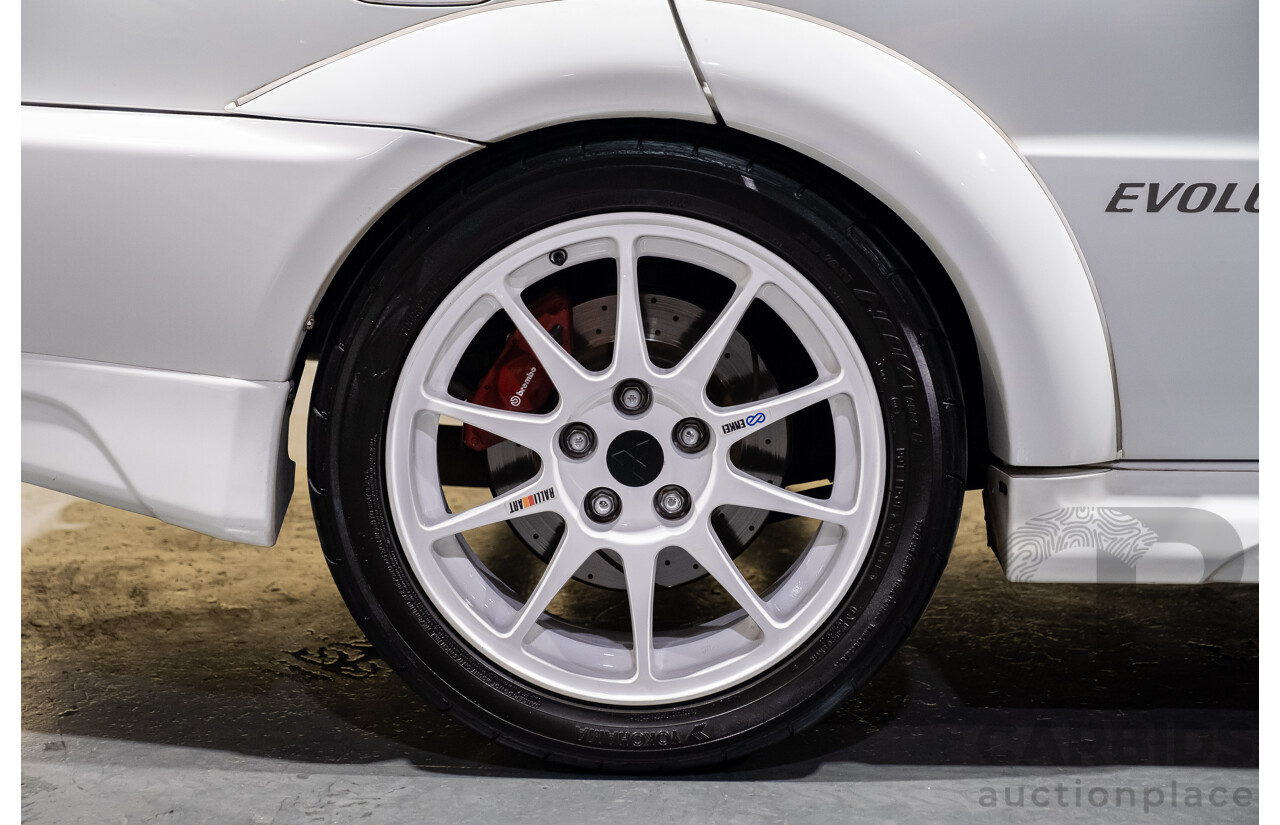 02/1998 Mitsubishi Lancer Evolution V AWD (Evo 5) 4d Sedan White Turbocharged 2.0L - Import