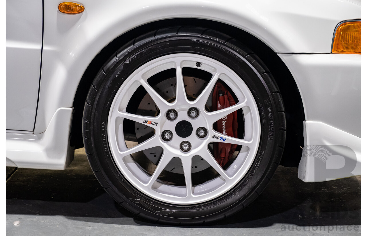 02/1998 Mitsubishi Lancer Evolution V AWD (Evo 5) 4d Sedan White Turbocharged 2.0L - Import