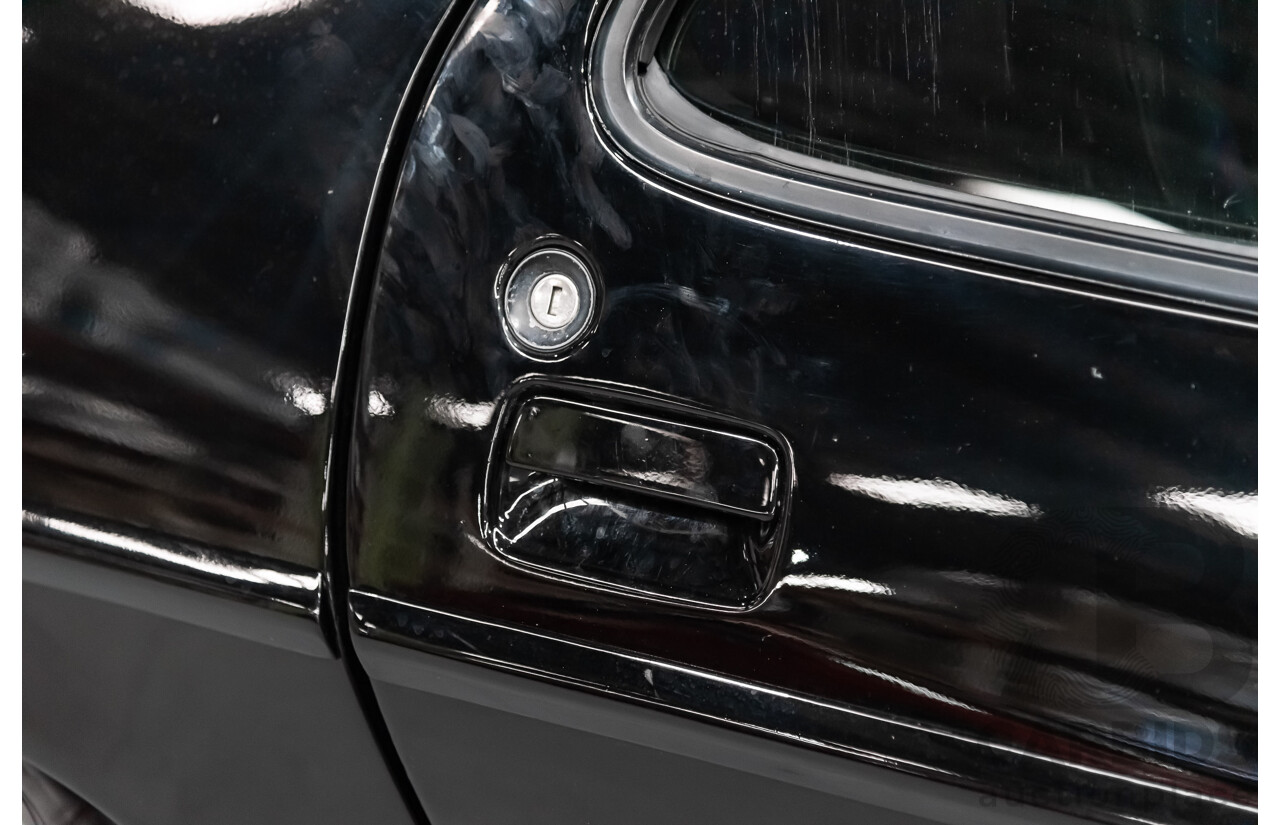 1/1985 Porsche 928 S  2d Coupe Black 4.7L V8