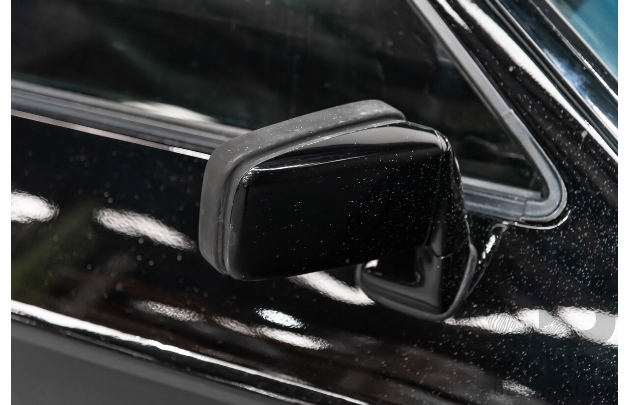 1/1985 Porsche 928 S  2d Coupe Black 4.7L V8