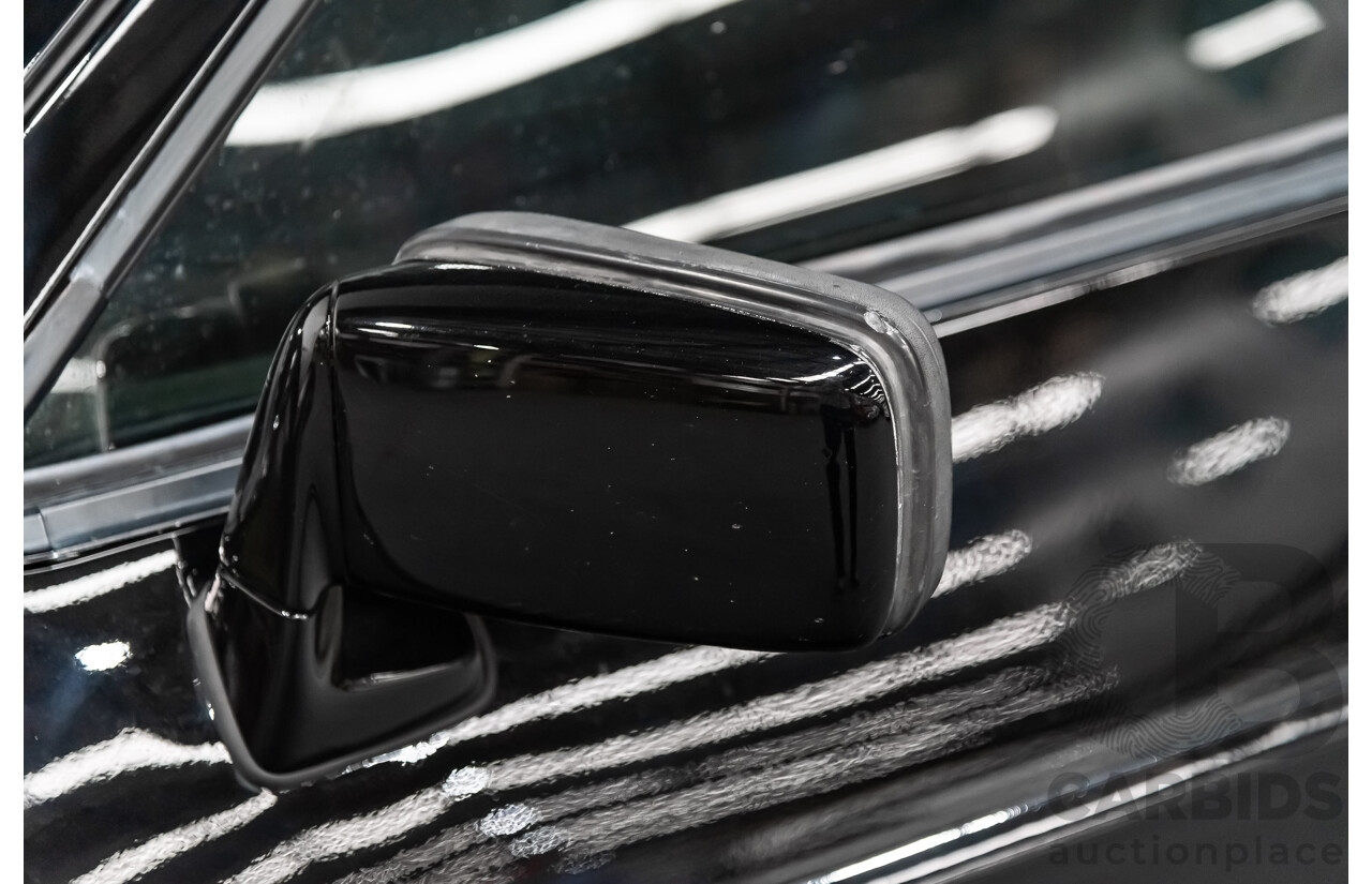 1/1985 Porsche 928 S  2d Coupe Black 4.7L V8